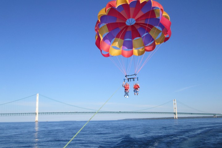 a parachute with a body of water